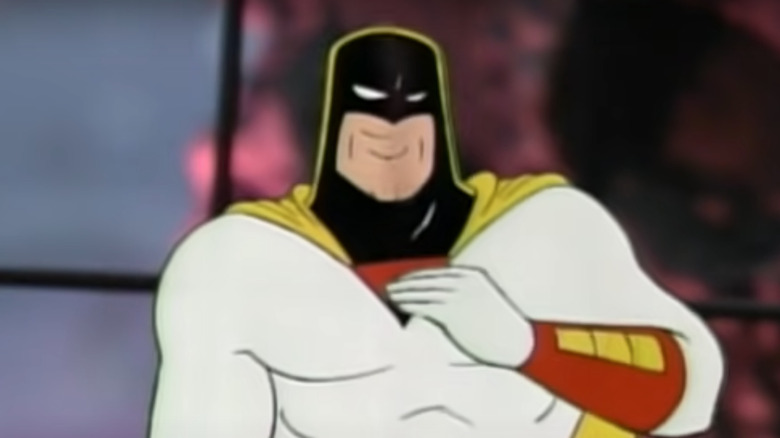 Space Ghost behind desk