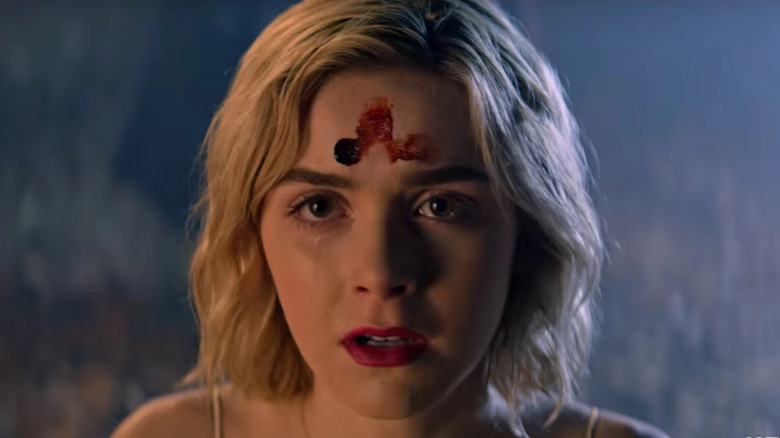 Sabrina Spellman with blood on forehead