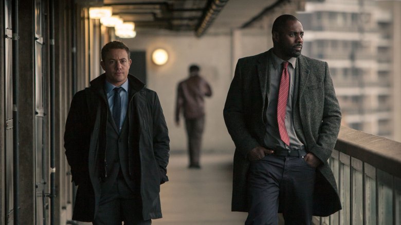 Idris Elba as Luther walking