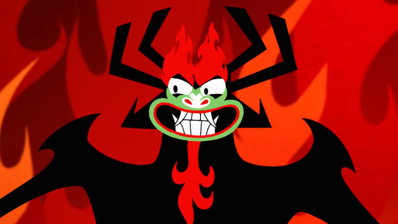 Aku smiles against flaming background