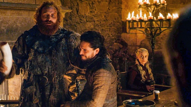 Coffee cup on table next to Daenerys on Game of Thrones