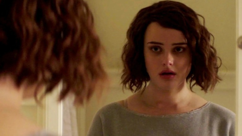 Hannah Baker looking in the mirror