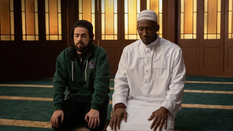 Ramy prays with his Shiekh