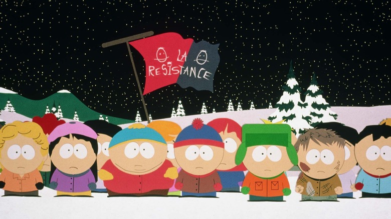 The kids of south park hold a flag