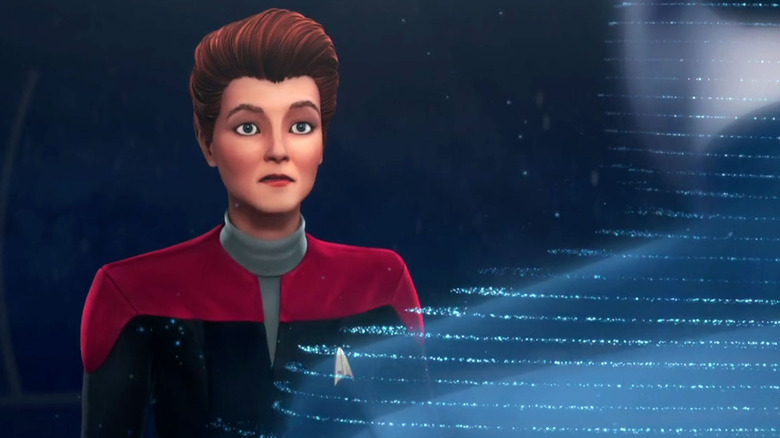 Janeway looks at hologram