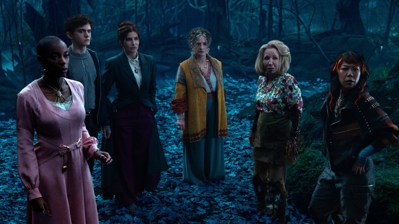 Agatha Harkness and coven in woods