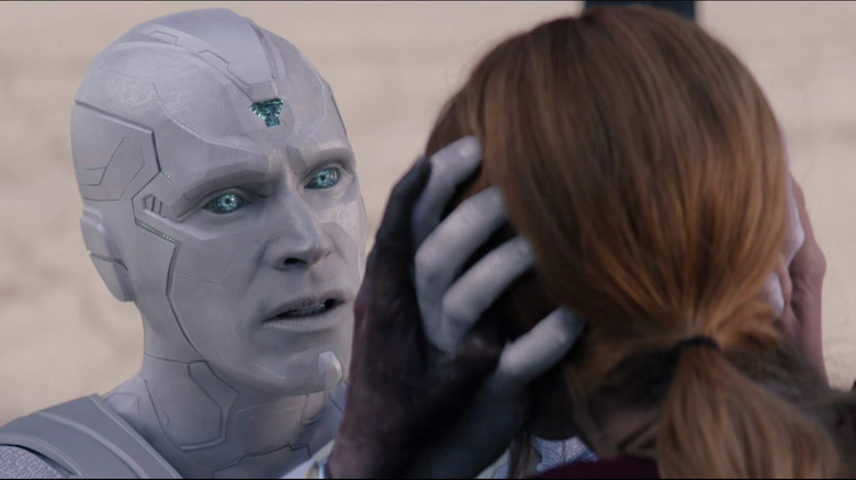 Vision holding Wanda's head