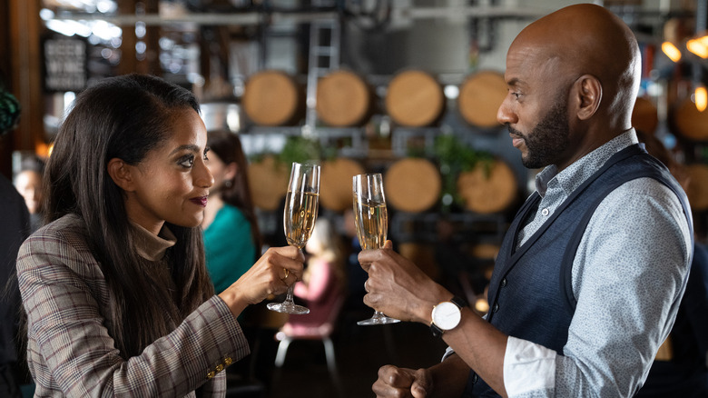 Rome and Regina toasting with champagne 