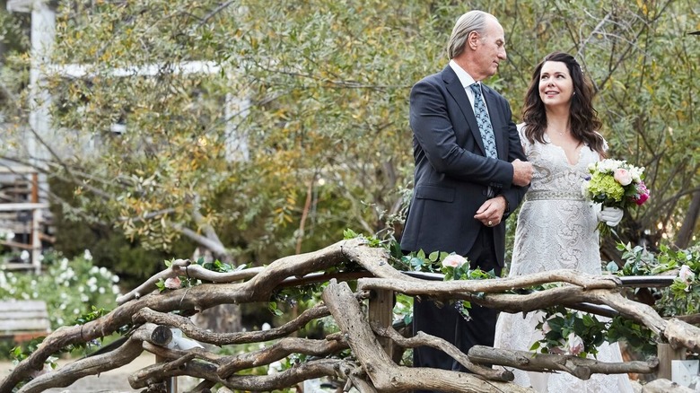 Zeke walks Sarah down the aisle 