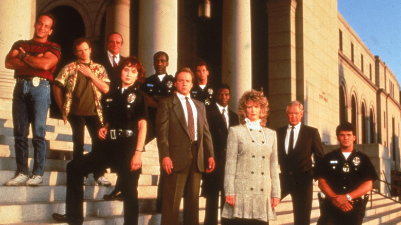 Cop Rock cast standing on stairs