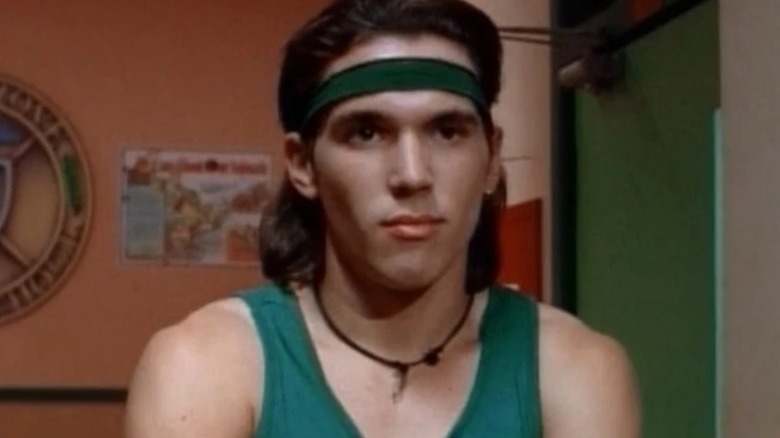 Tommy in green headband