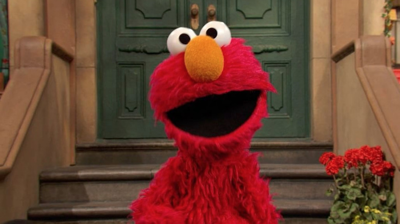 Elmo in front of steps