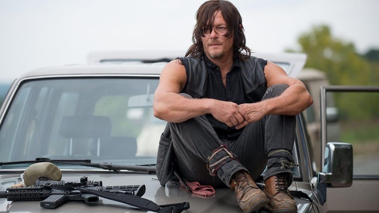 Daryl sits on truck