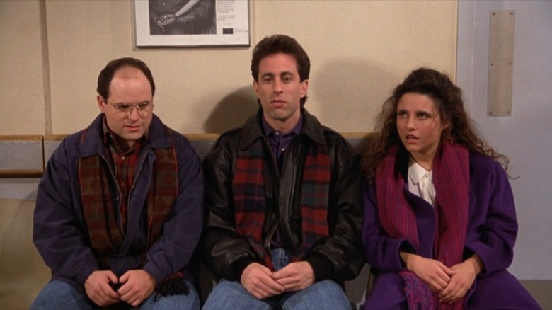 George, Elaine, Jerry sitting