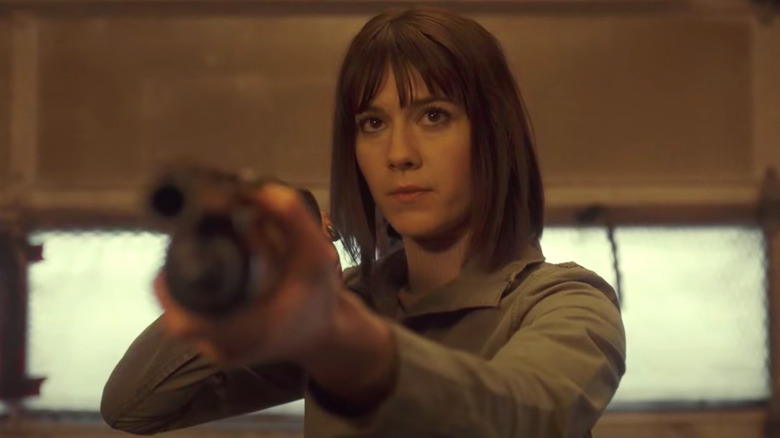 Nikki Swango with shotgun