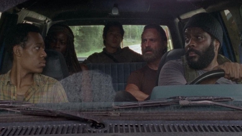 The cast of The Walking Dead in a car