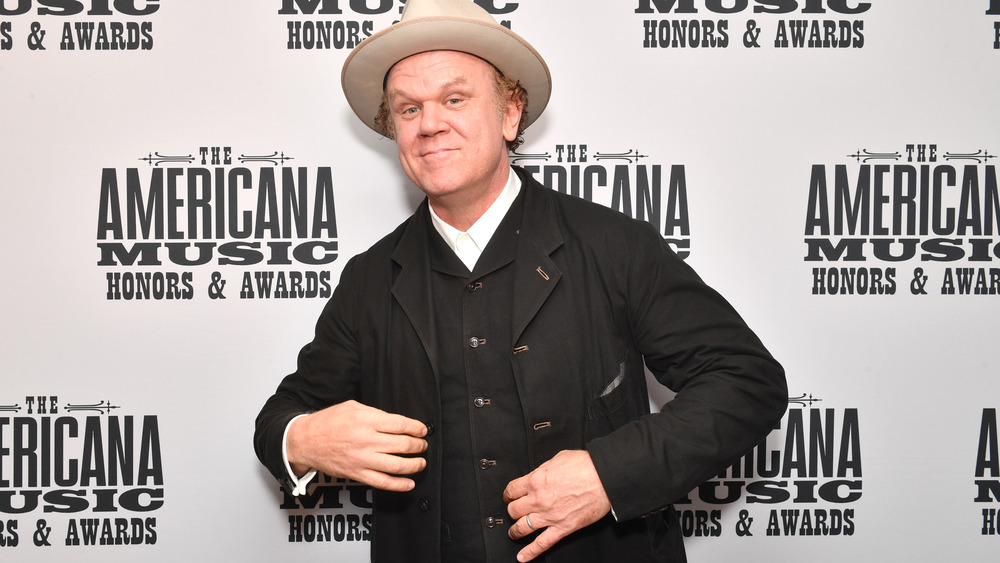 John C. Reilly posing