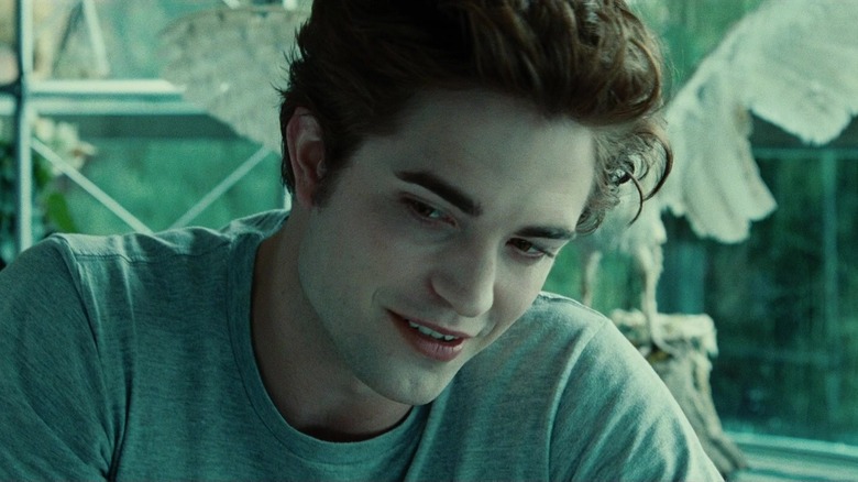 Edward Cullen smiling with tousled hair