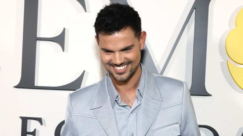 Taylor Lautner laughing smiling