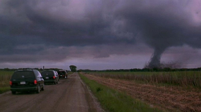 Cars chase tornado