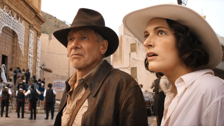 Indiana Jones and Helena Shaw outside