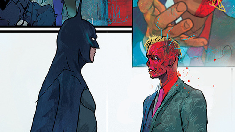 Batman standing next to Two-Face