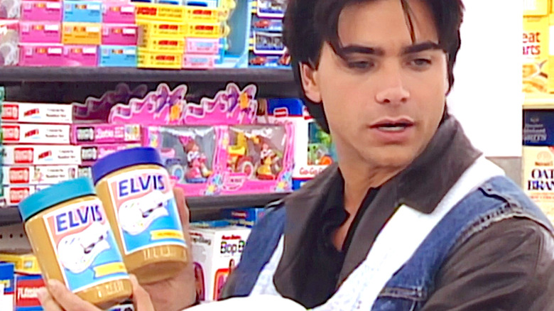 Uncle Jesse holds Elvis jars