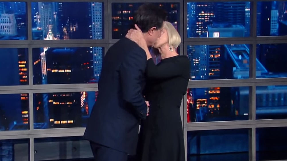 Helen Mirren kisses Stephen Colbert