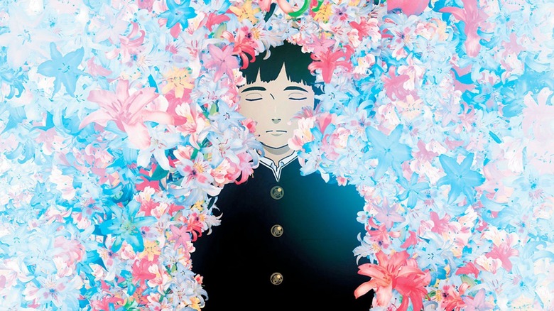 Makoto surrounded by flowers