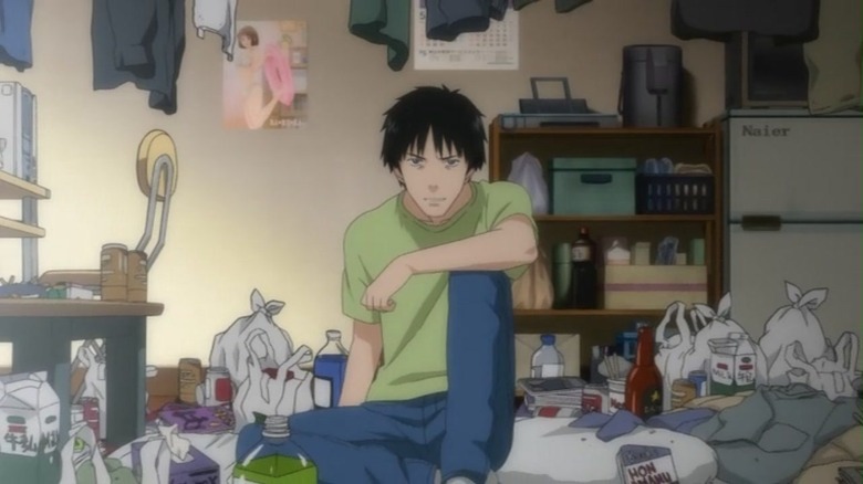 Sato is his messy apartment