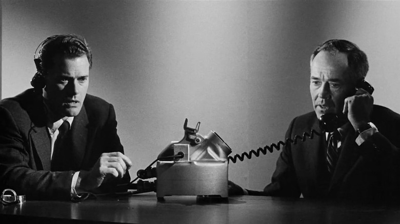 Henry Fonda talks on the phone