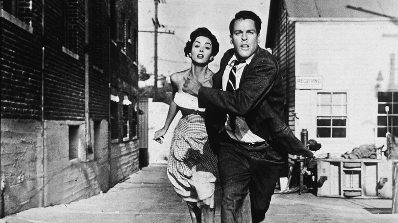 Kevin McCarthy and Dana Wynter running