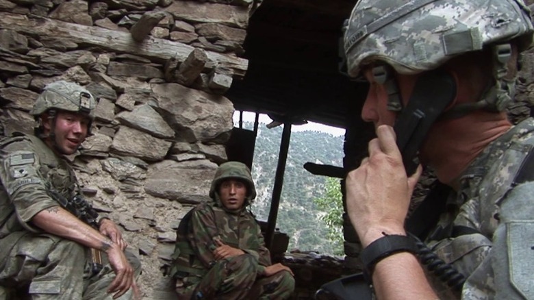 Soldiers sitting in bunker