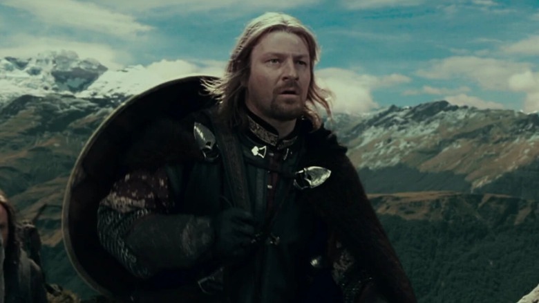 Boromir climbing a mountain