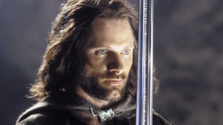 Aragorn holding a sword