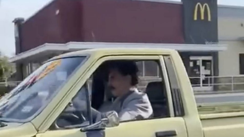 Borat driving around Los Angeles filming the sequel