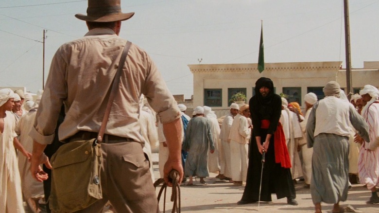 Indiana Jones finding himself in a desert fight