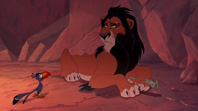 Scar talking with Zazu while a mouse escapes