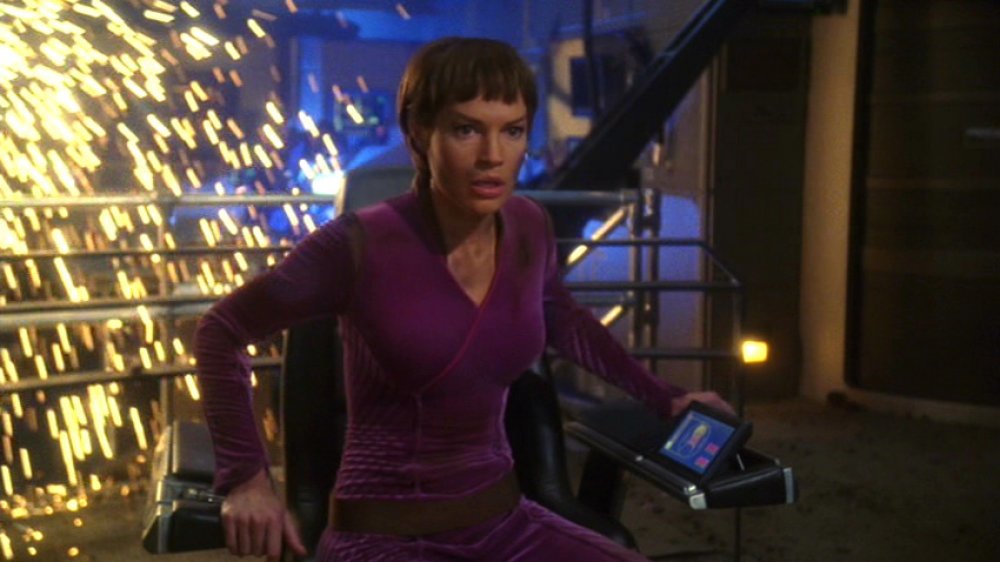 Subcommander T'Pol on a battle-ravaged bridge