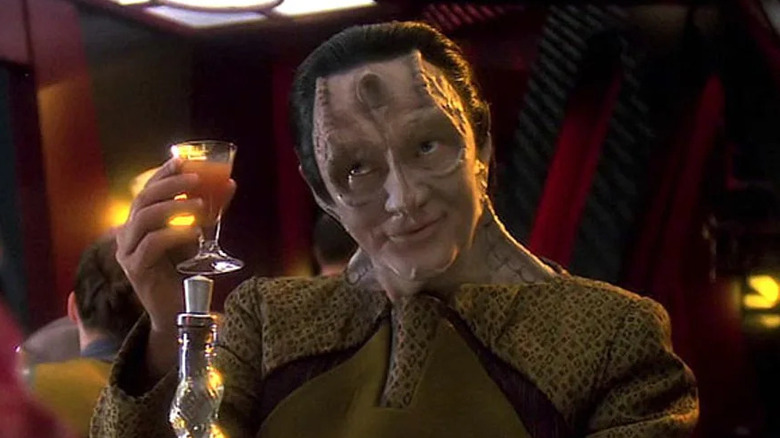 Garak toasts a glass of kanar