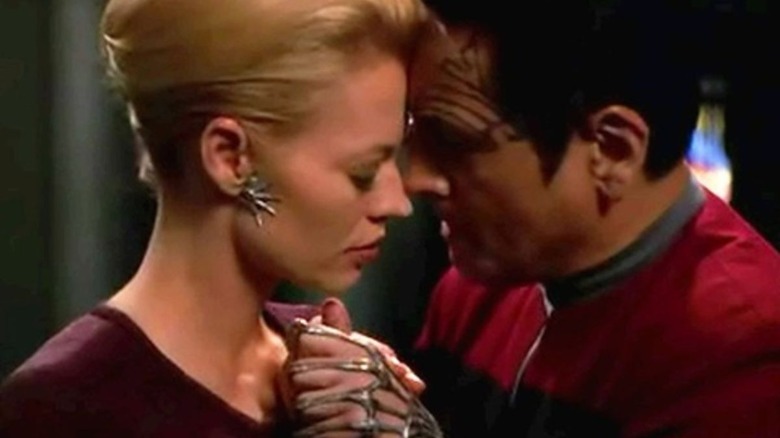 Seven and Chakotay embrace