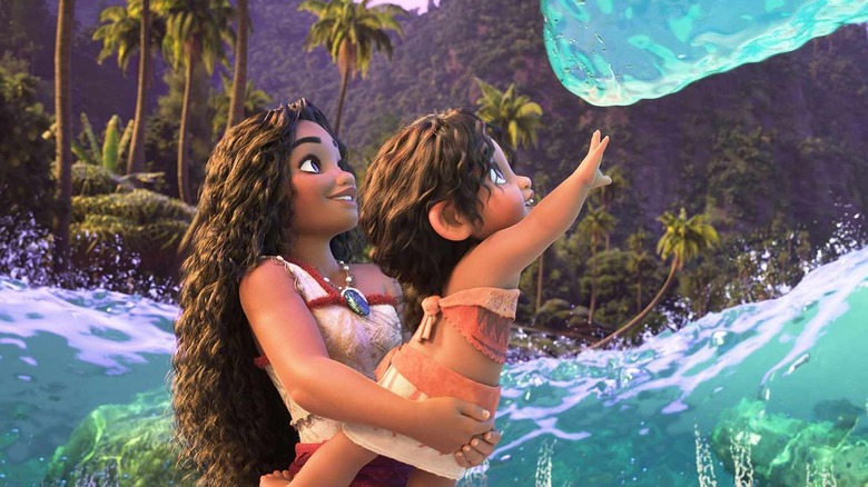 Moana holds sister to water