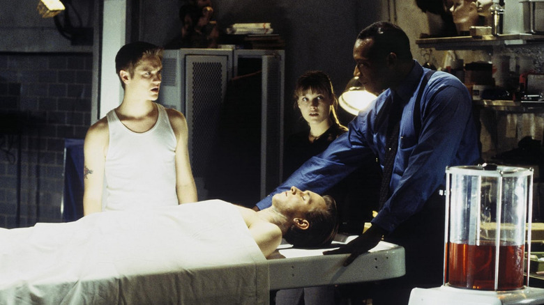 Cast with dead body in morgue