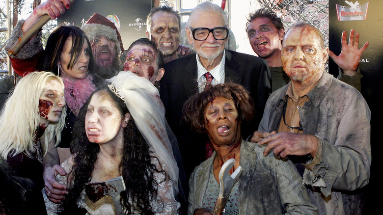 George Romero with zombie actors