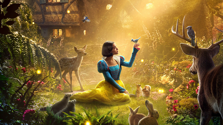 Snow White sitting with animals