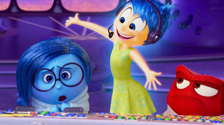 Sadness, Joy, and Anger at the control desk in Inside Out 2