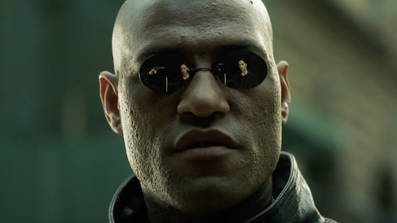 Morpheus watches Neo