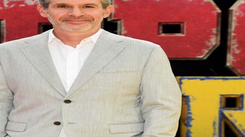 Simon Kinberg smiling at the Deadpool & Wolverine premiere in July 2024 in New York City