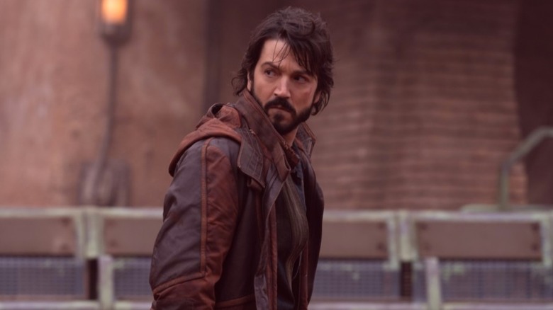 Cassian Andor walking on Ferrix in Star Wars: Andor