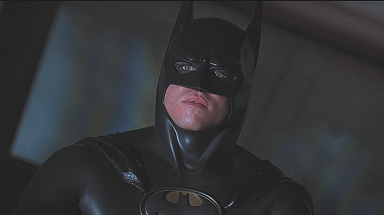 Val Kilmer in Batman Forever looks on